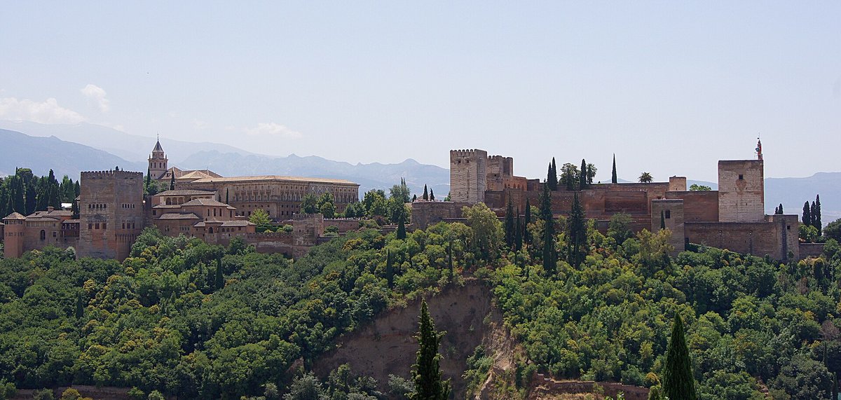 The towers of the Alhambra on their wooded hill