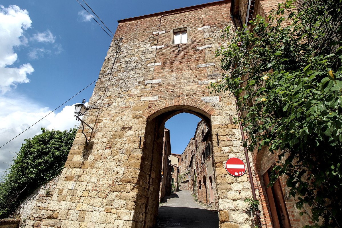 A stone gateway and lane in Montepulciano